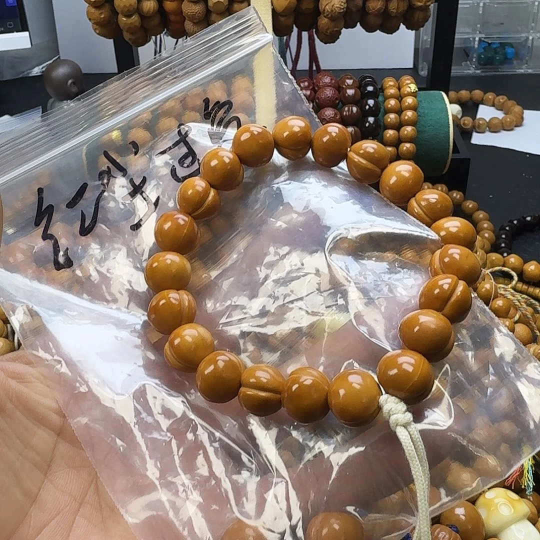 颜***夏猴头核桃手串屁桃