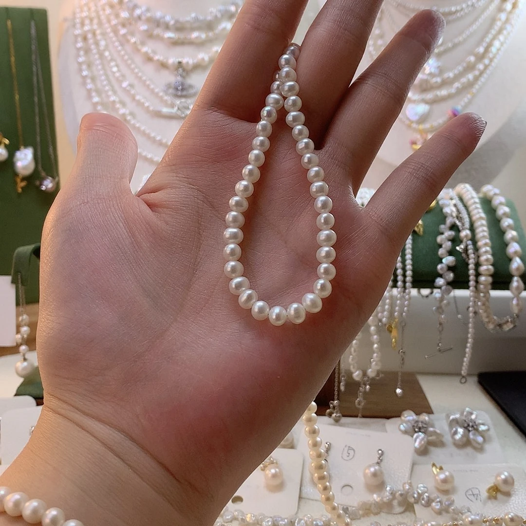 我***狗淡水珍珠银S925镶嵌手绳弹力绳5-6