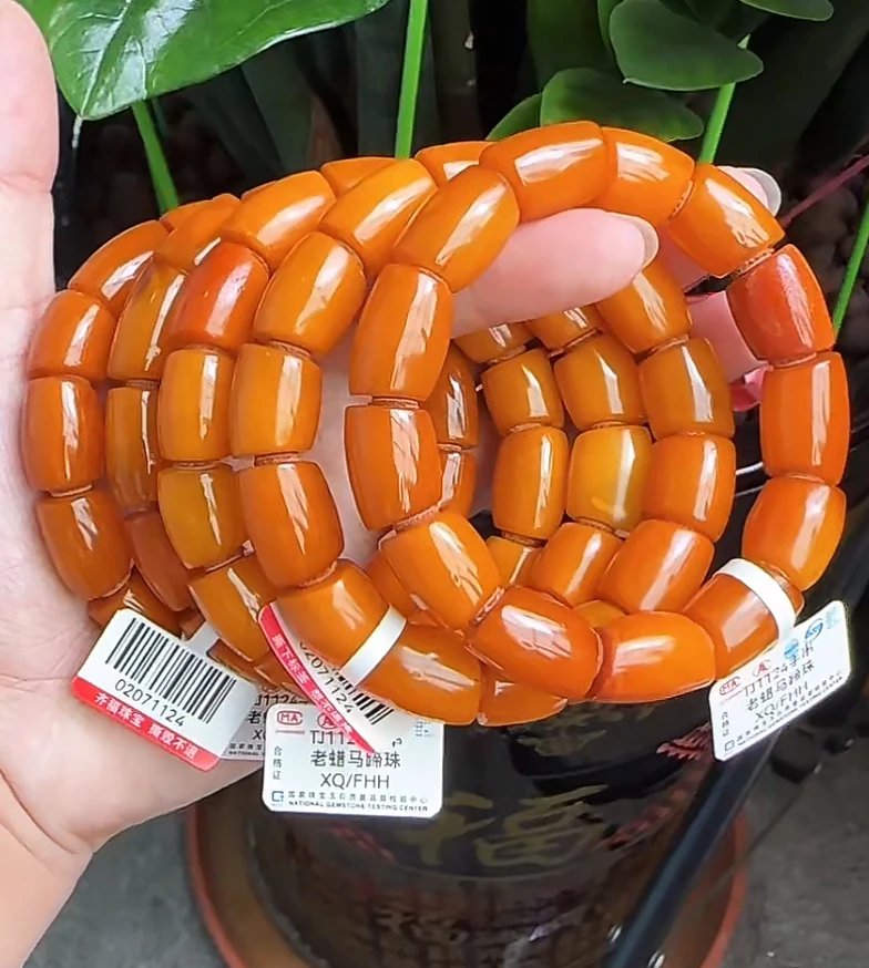 【齐福珠宝】TJ1124/11mm天然琥珀蜜蜡马蹄珠手串（多样性发其一）