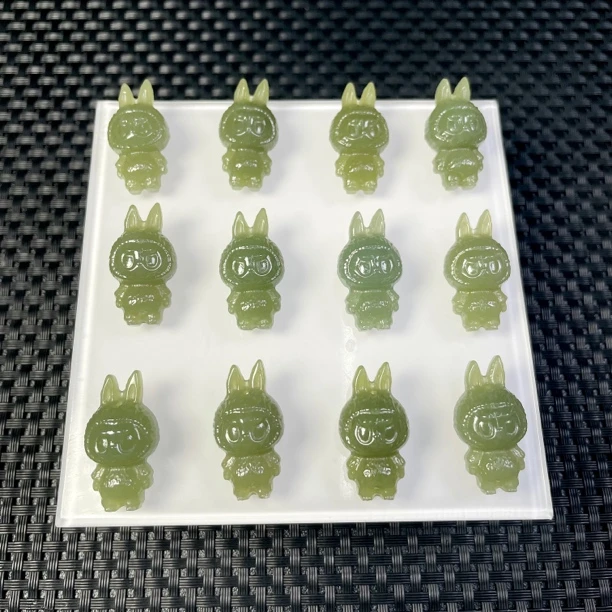 新疆和田玉冰底果绿拉布布大首领约27mm立体雕刻（多样性发一件）