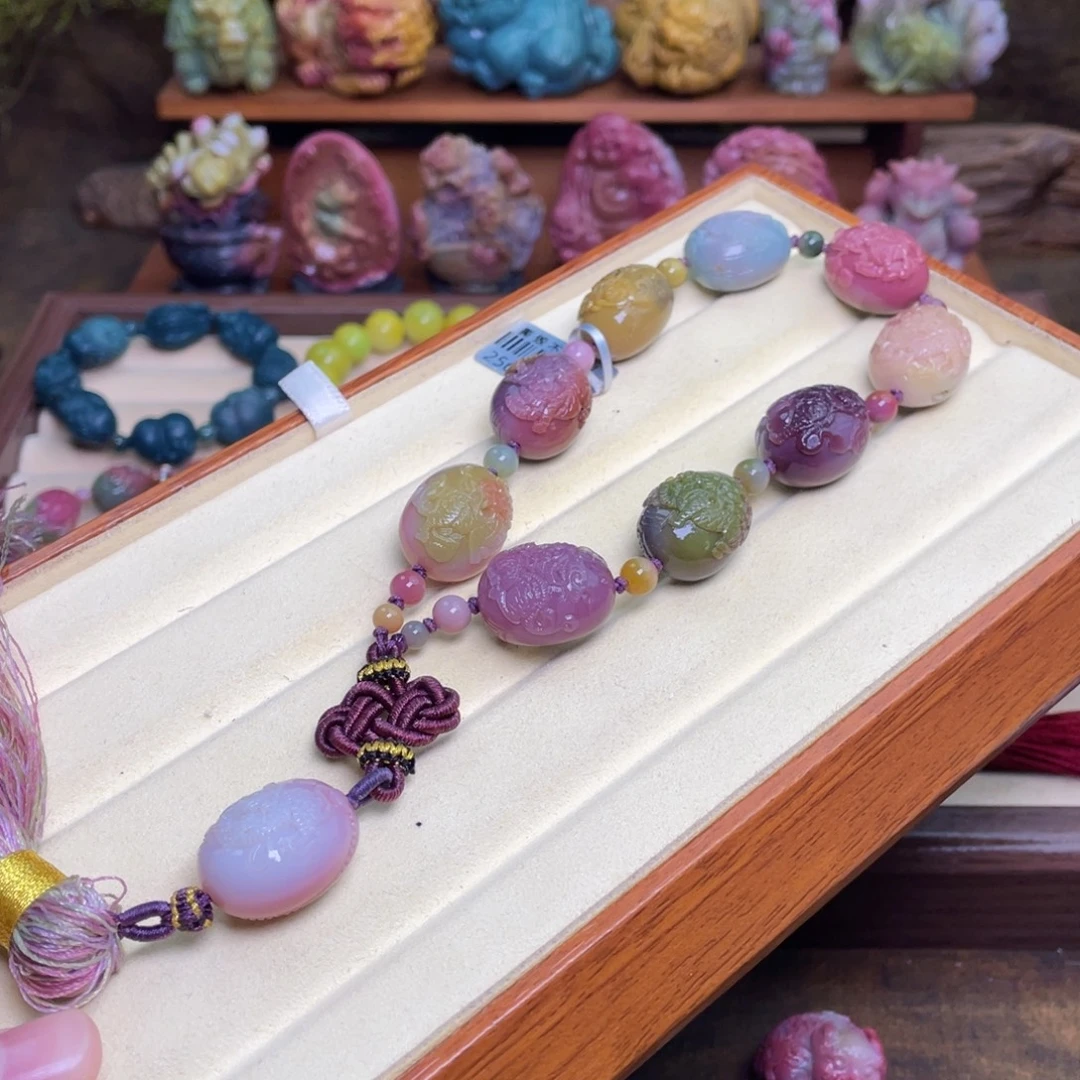 阳***光玛瑙/玉髓未镶嵌珠宝半成品盐源玛瑙麒麟手持