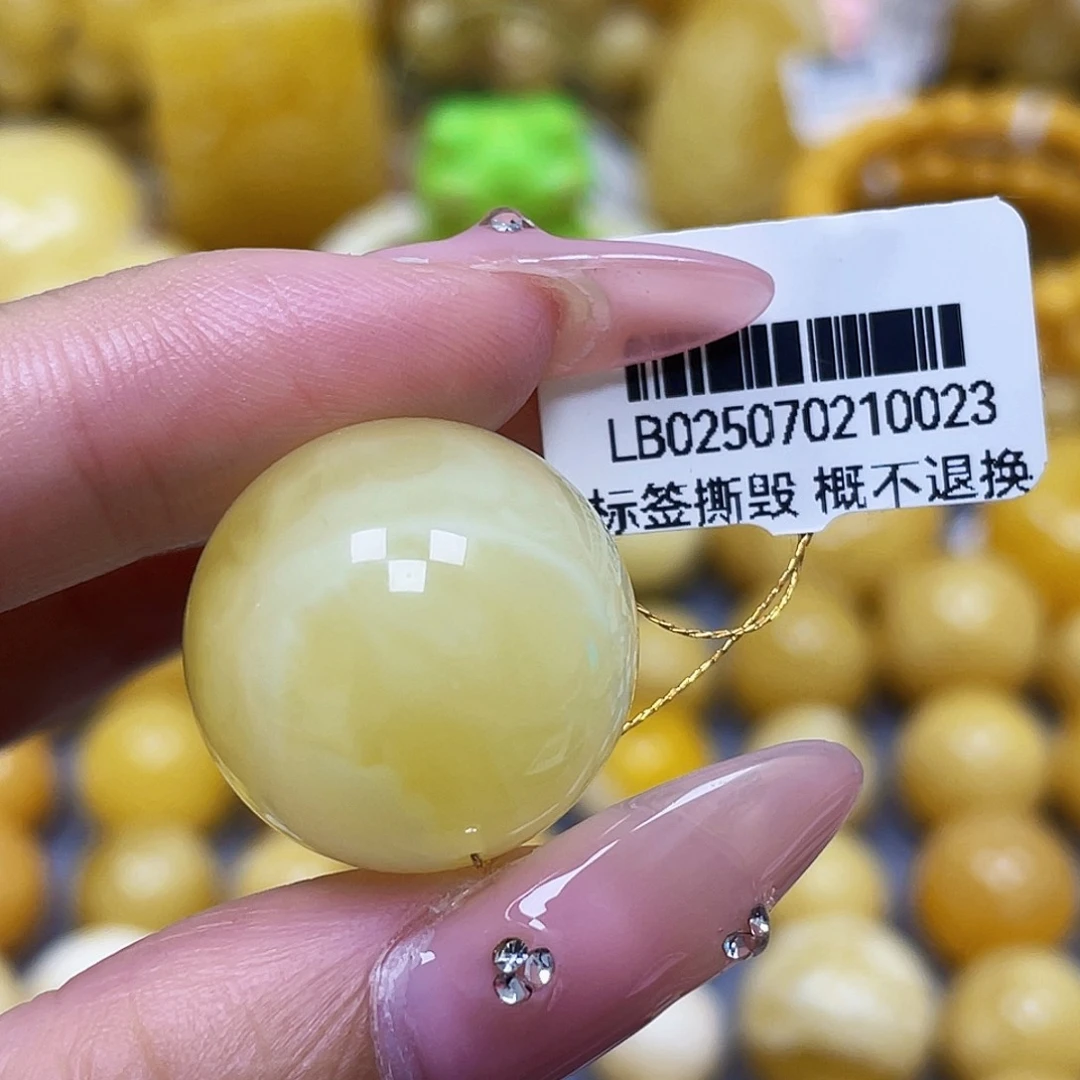 蜜蜡未镶嵌裸石21.2mm瑕