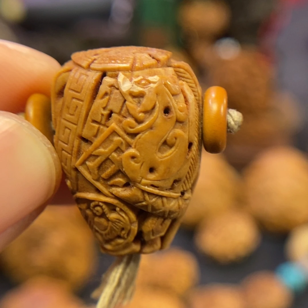 潍坊核雕桃核雕刻锦灰堆三通