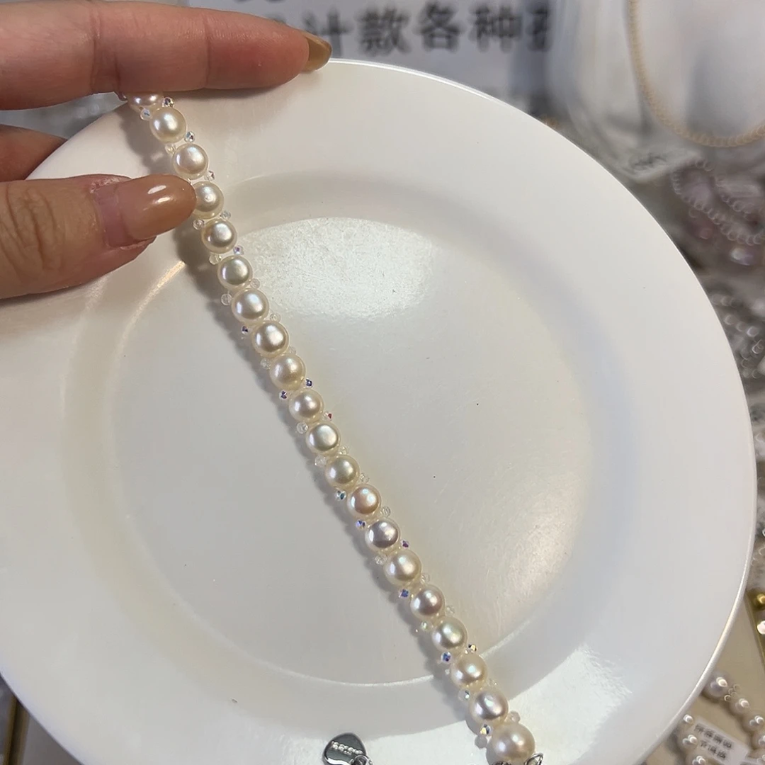 紫***啧淡水珍珠天然淡水珍珠钛钢