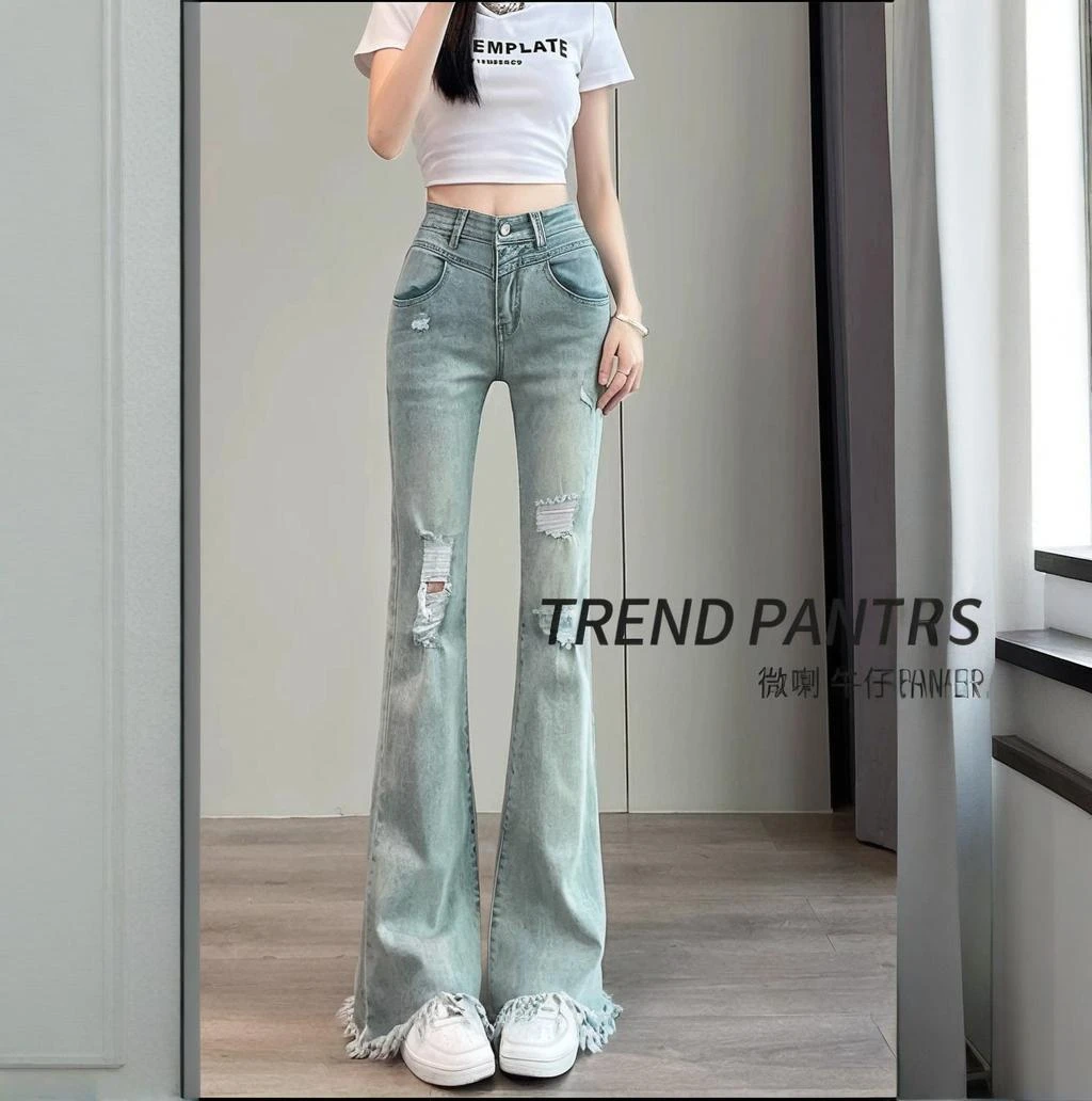 大码高腰破洞微喇牛仔裤女2025秋季新款显瘦毛边拖地阔腿喇叭裤子