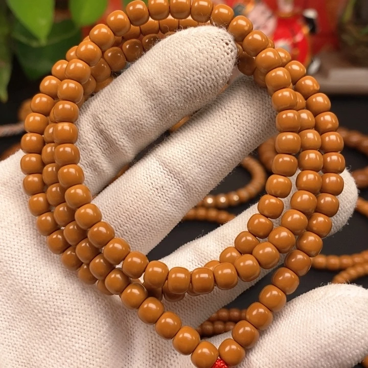 橄榄核手串6.0老挝核尖极限弧108微微白