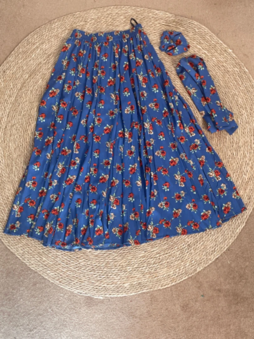 风华珏（蓝魅）早秋百搭时尚复古修身两侧口袋A字碎花半身裙显瘦