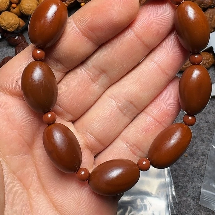 橄榄核手串你的电话