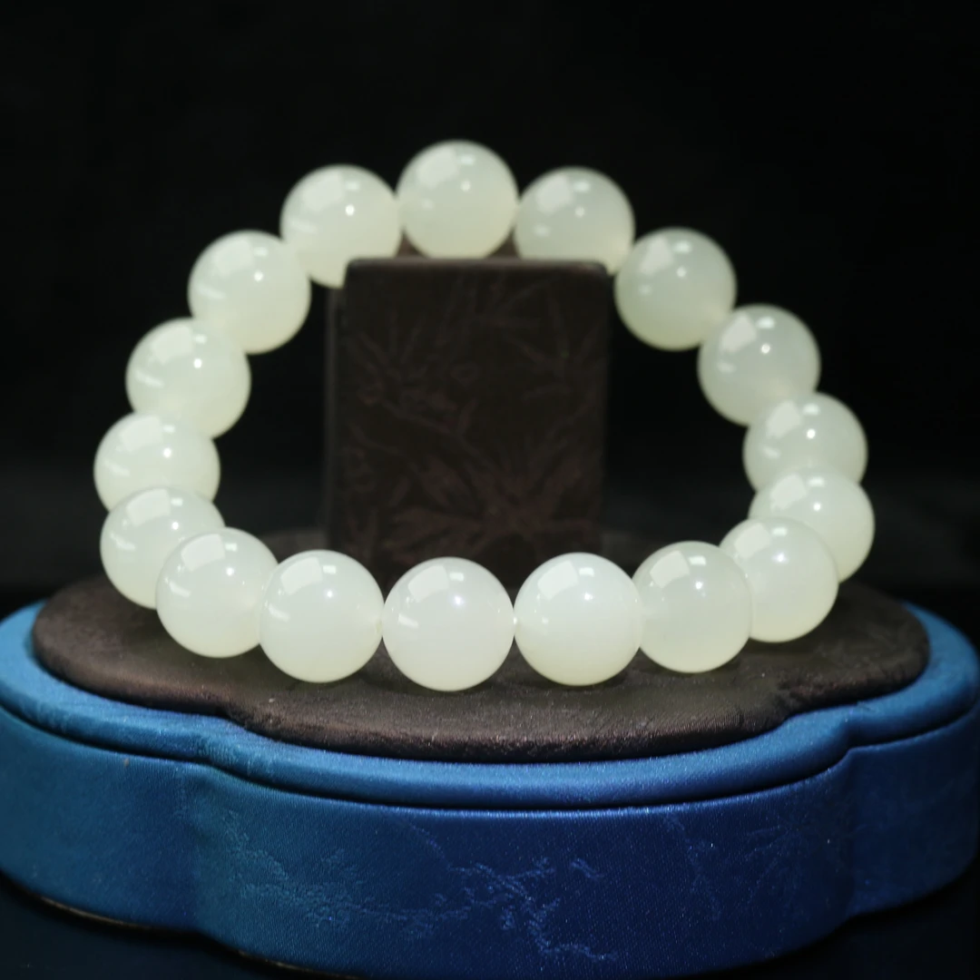 6和田玉蜂蜜水手串/300186保利厦门拍卖