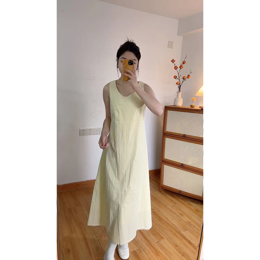“淡黄长裙” 背心收腰连衣裙