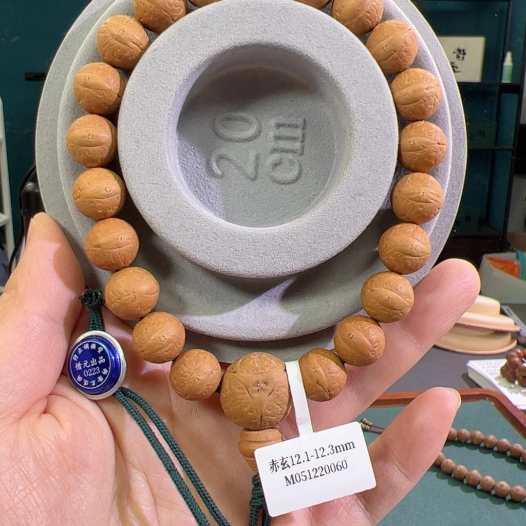 凤眼菩提手串赤玄红皮12