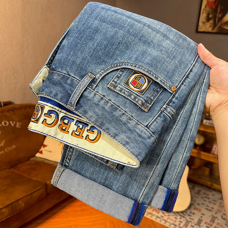 夏季新品男士牛仔裤潮流刺绣百搭款男裤修身小直筒水洗蓝色长裤子