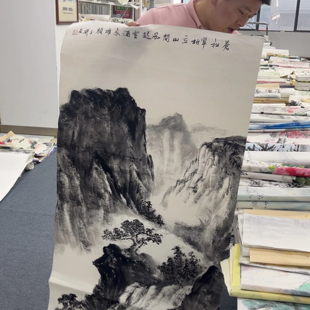 国画卖字画的小帅哥
