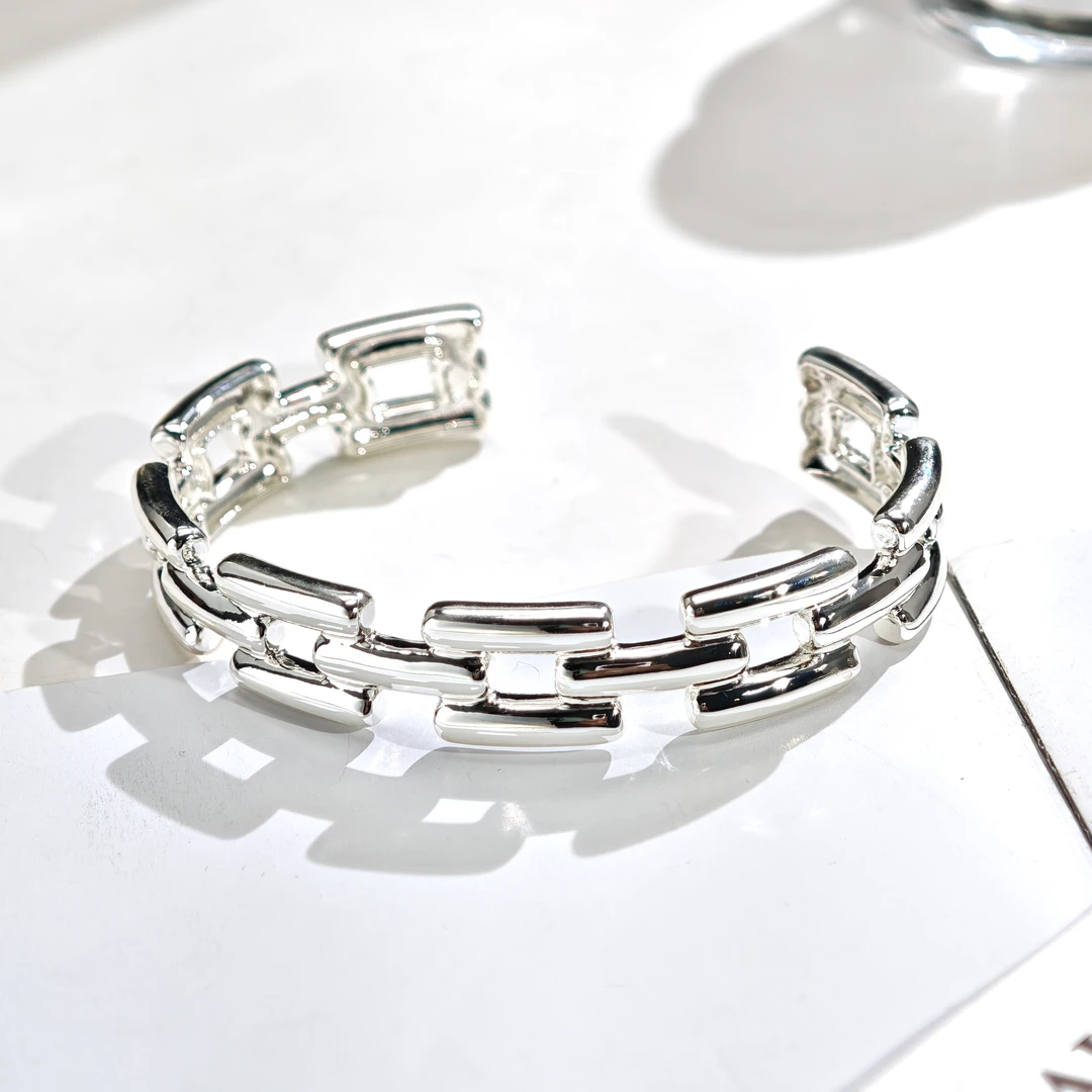 铜合金手镯 05932时尚设计感镂空几何交错手镯