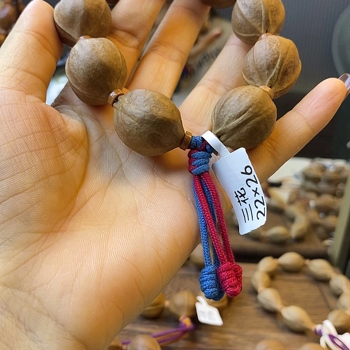 哎***呀橄榄核吊坠梅林铁核