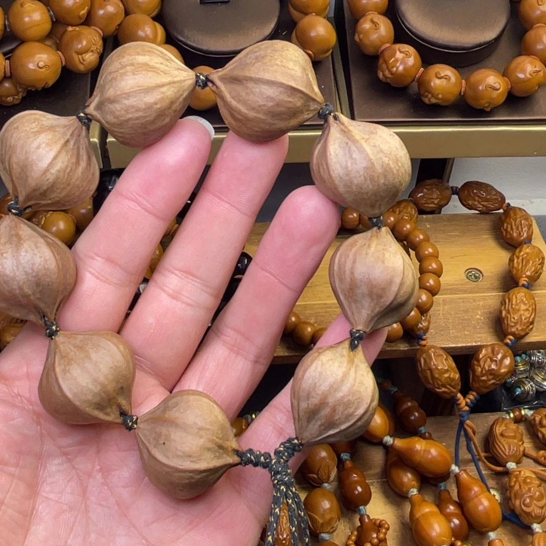 এ***༊橄榄核手串/手链2629四花