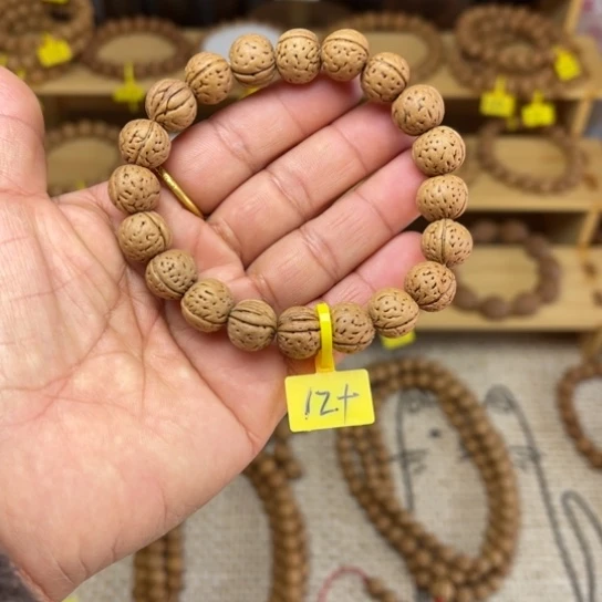 木质野生桃核手串