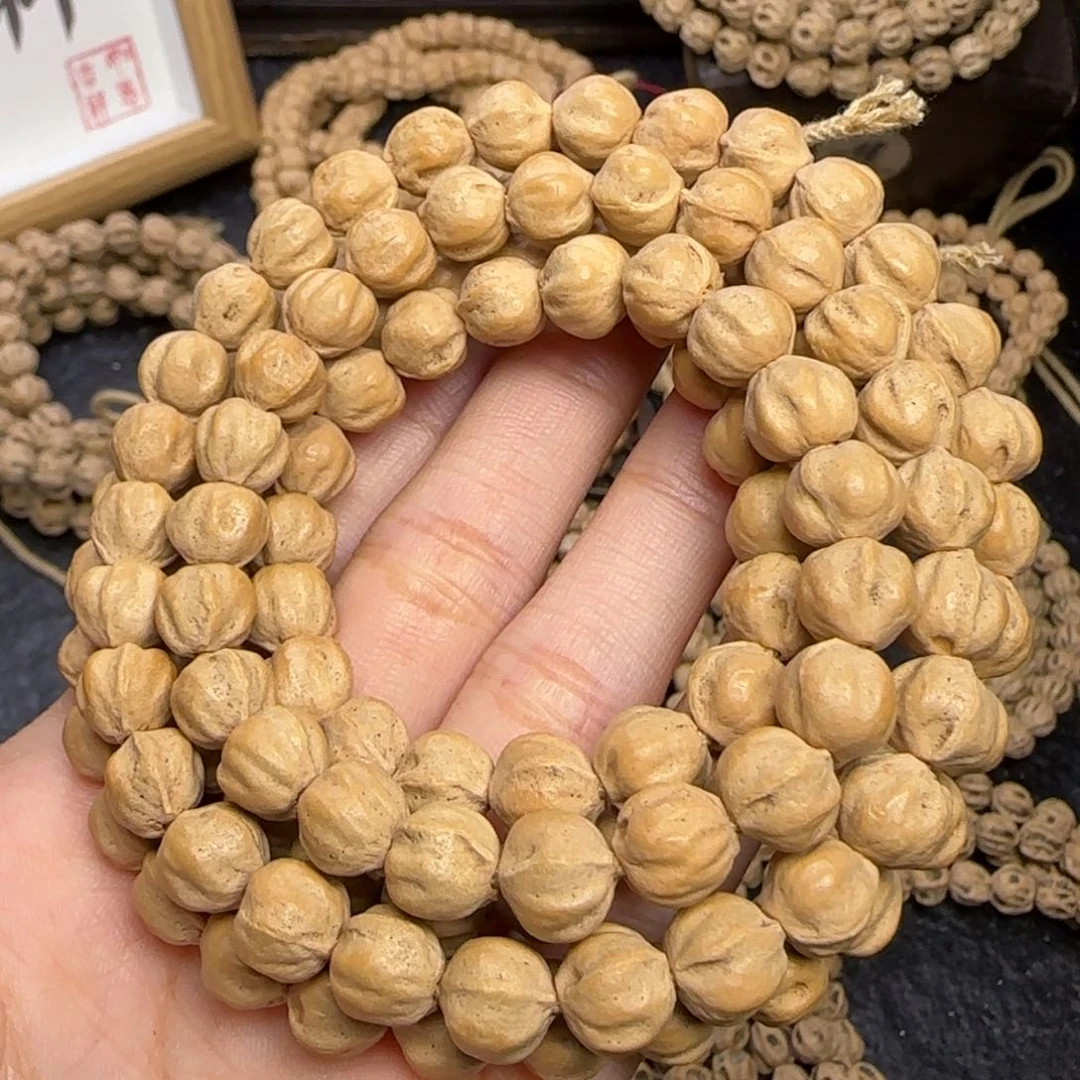 柏香籽/百香籽吊坠生****王