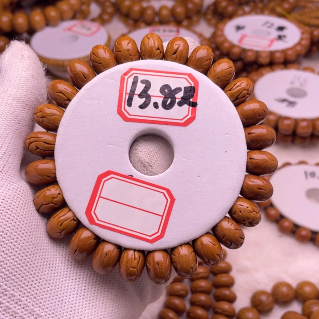 【闪购商品】桃核吊坠格*13.8龙纹算盘珠桃核光珠