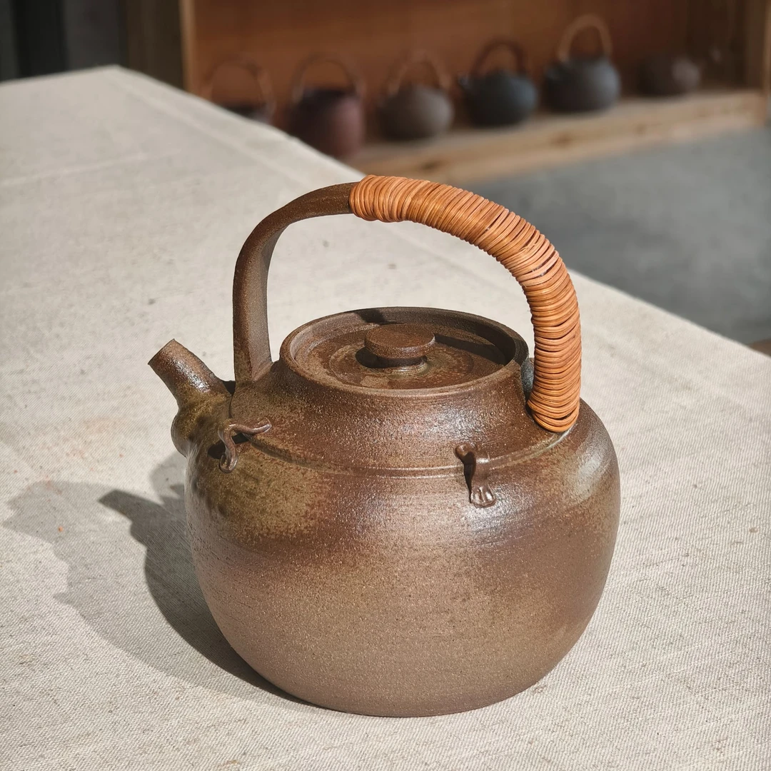 潮州金石全手工藤编提梁陶壶柴烧煮水壶复古砂铫煮茶壶养生泡茶壶