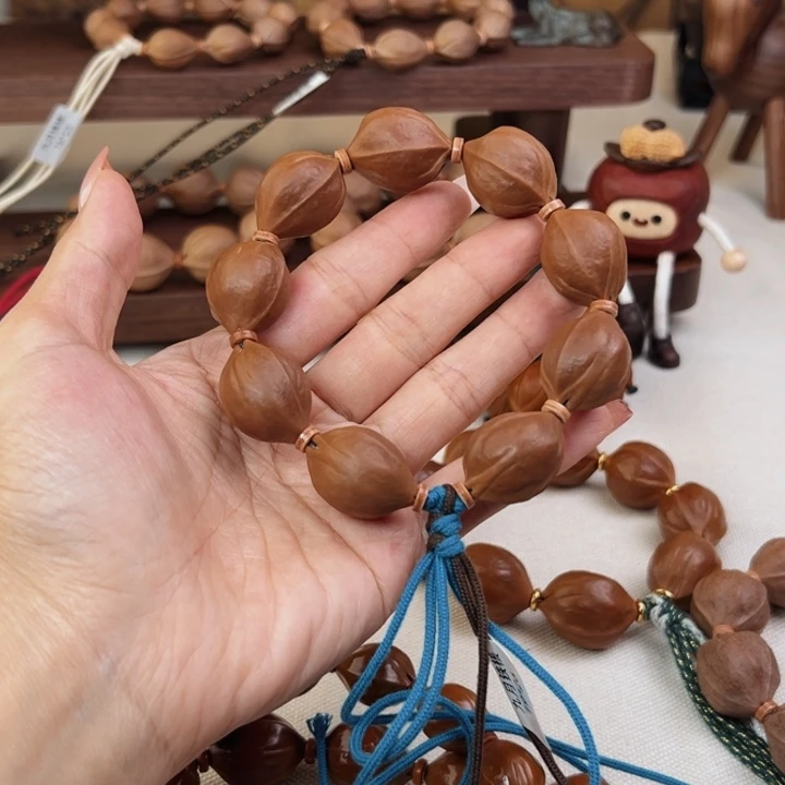 *****橄榄核手串19*26三花核串