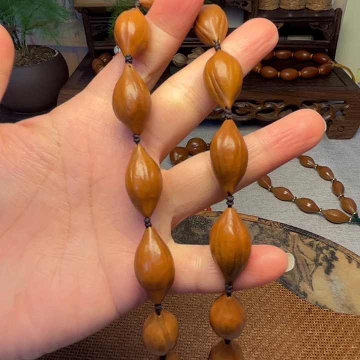 橄榄核手串/手链梅林水晶三面佛手持