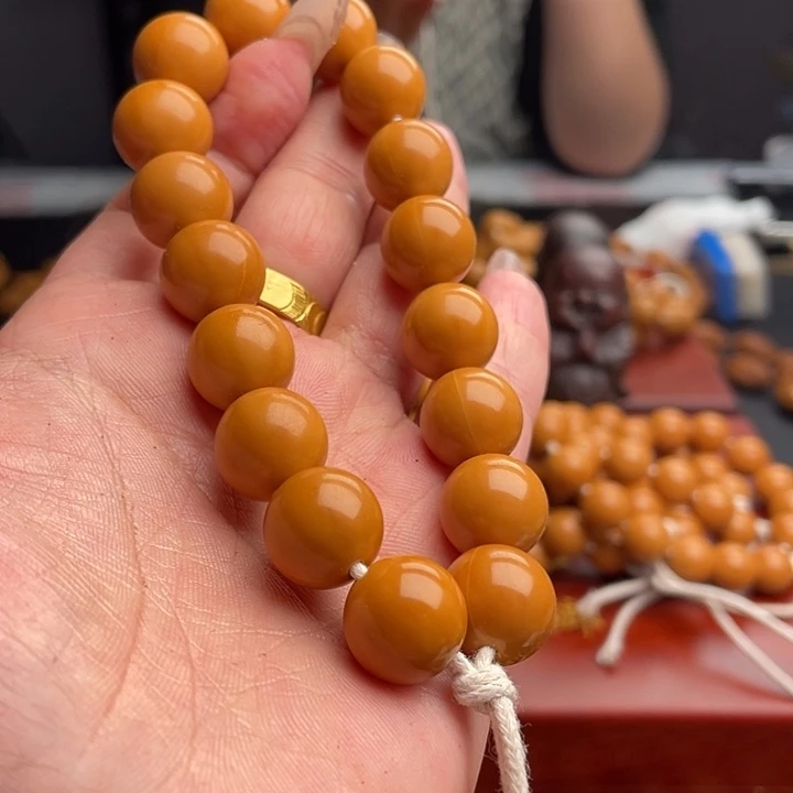 橄榄核吊坠猴头手串