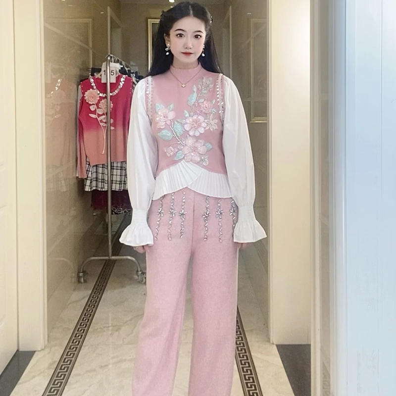 2025新款轻奢名媛风小众设计感收腰显瘦粉色假两件拼接毛衣女