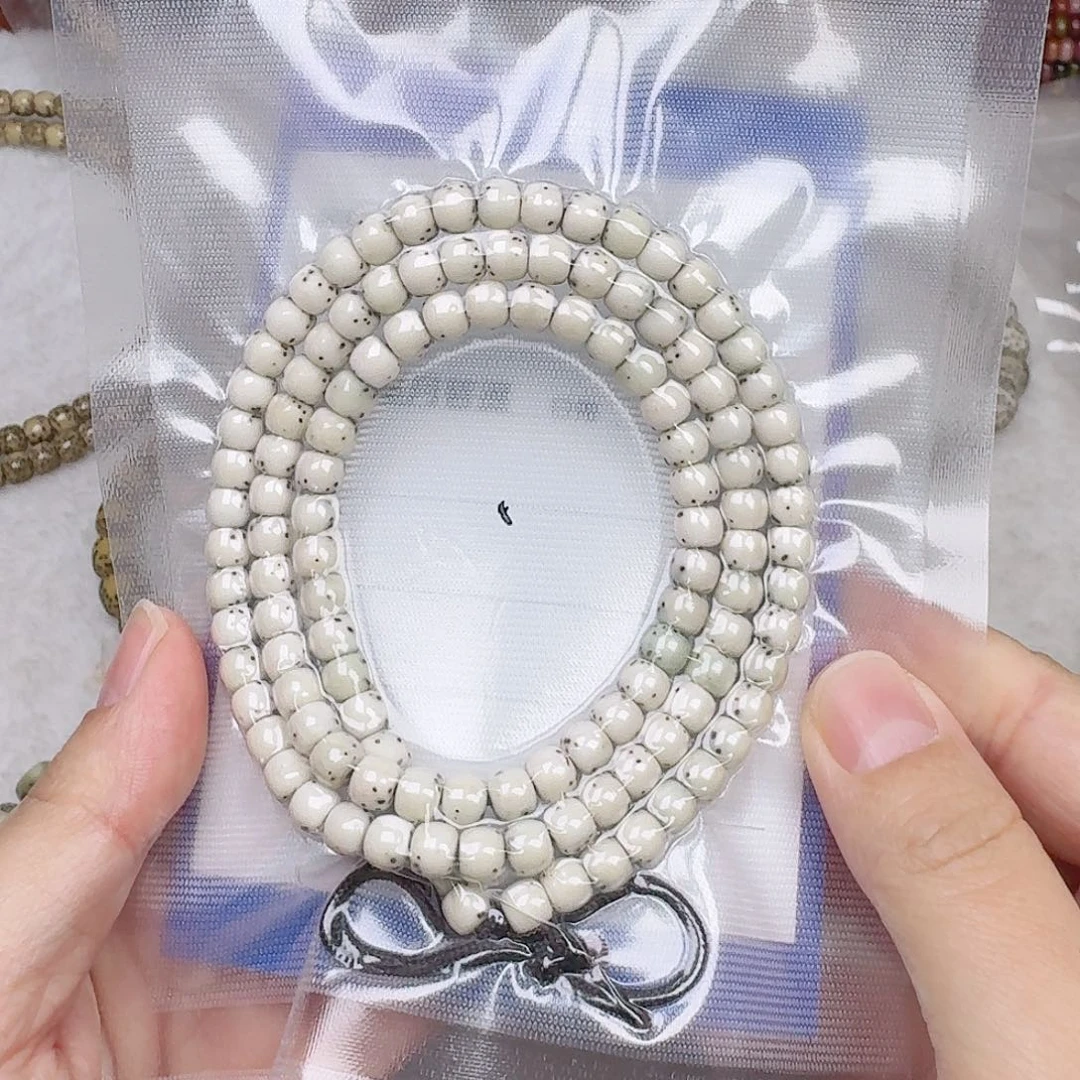 星月菩提手串卢***肩6/7石玉料瓷白河豚108