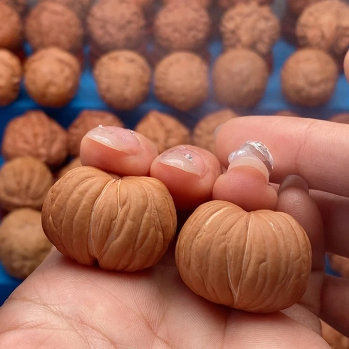 文玩核桃把件精品文玩手捻猴宝