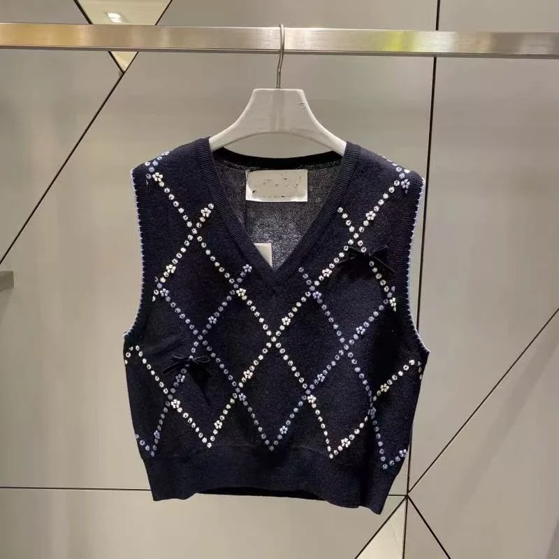 AW251175  Lucky天鹅绒蝴蝶结菱格针织马甲