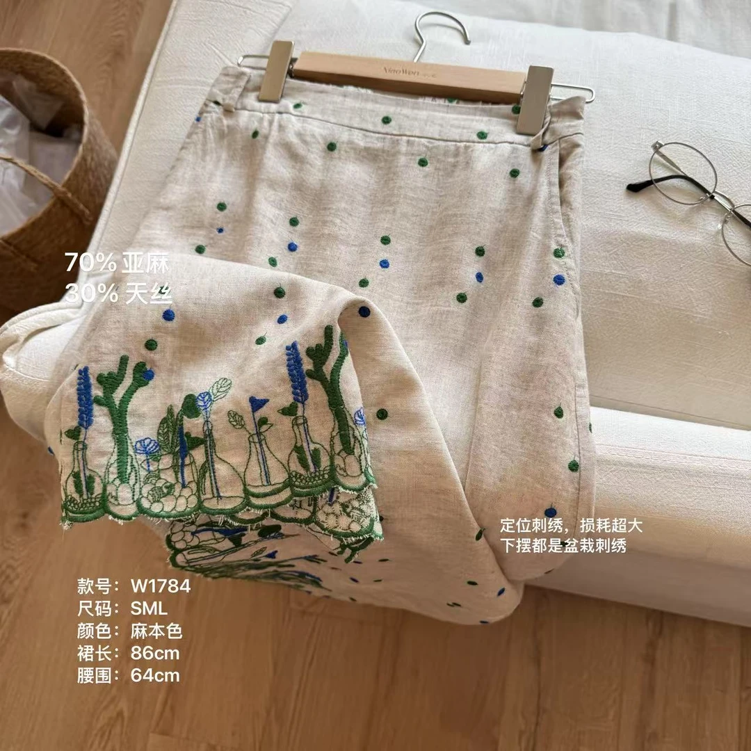 小文姐 W1784-通勤时尚波点设计感下摆刺绣后腰松紧半身裙