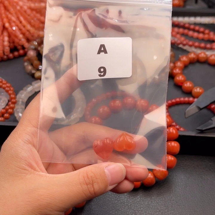 呵***呵南红玛瑙未镶嵌多样性发货默认微瑕屁桃