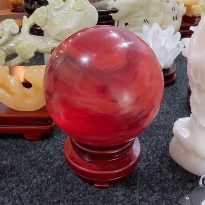 湖***佬石材红水晶球特价摆件