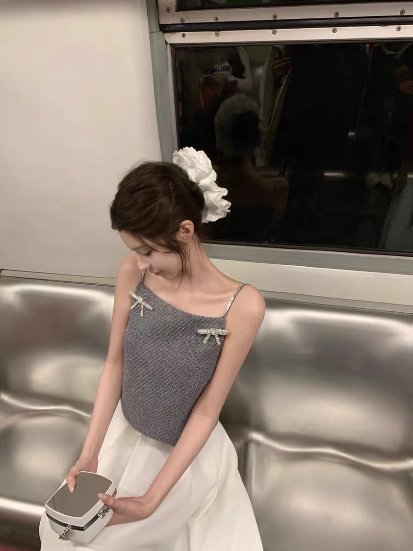 JUJU【古灵精怪】钻石蝴蝶结亮丝毛呢吊带背心女