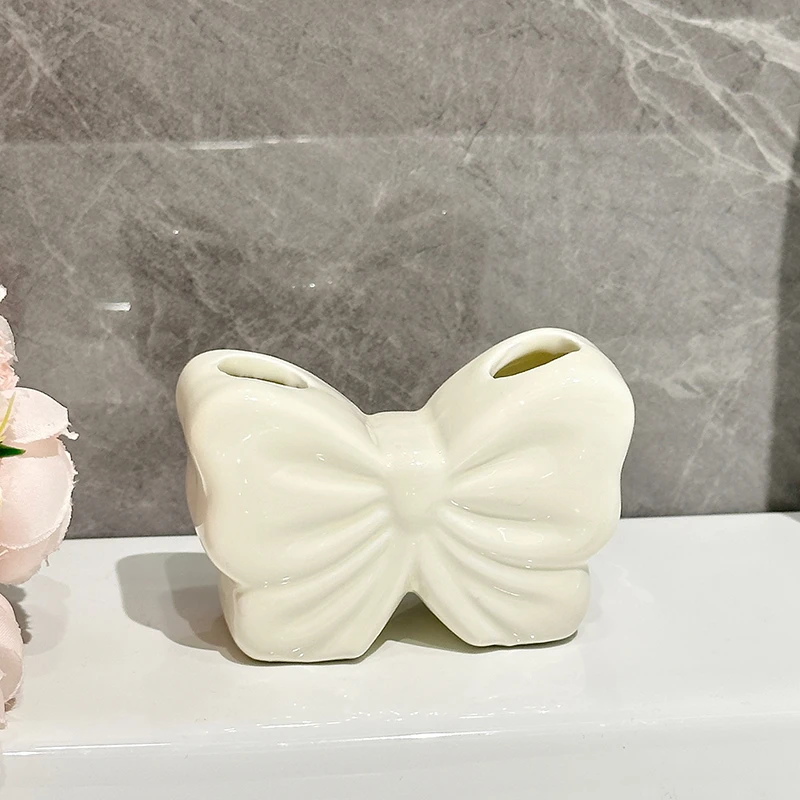 创意可爱蝴蝶结牙刷架客厅办公室陶瓷牙刷架ins高级感轻奢高颜值