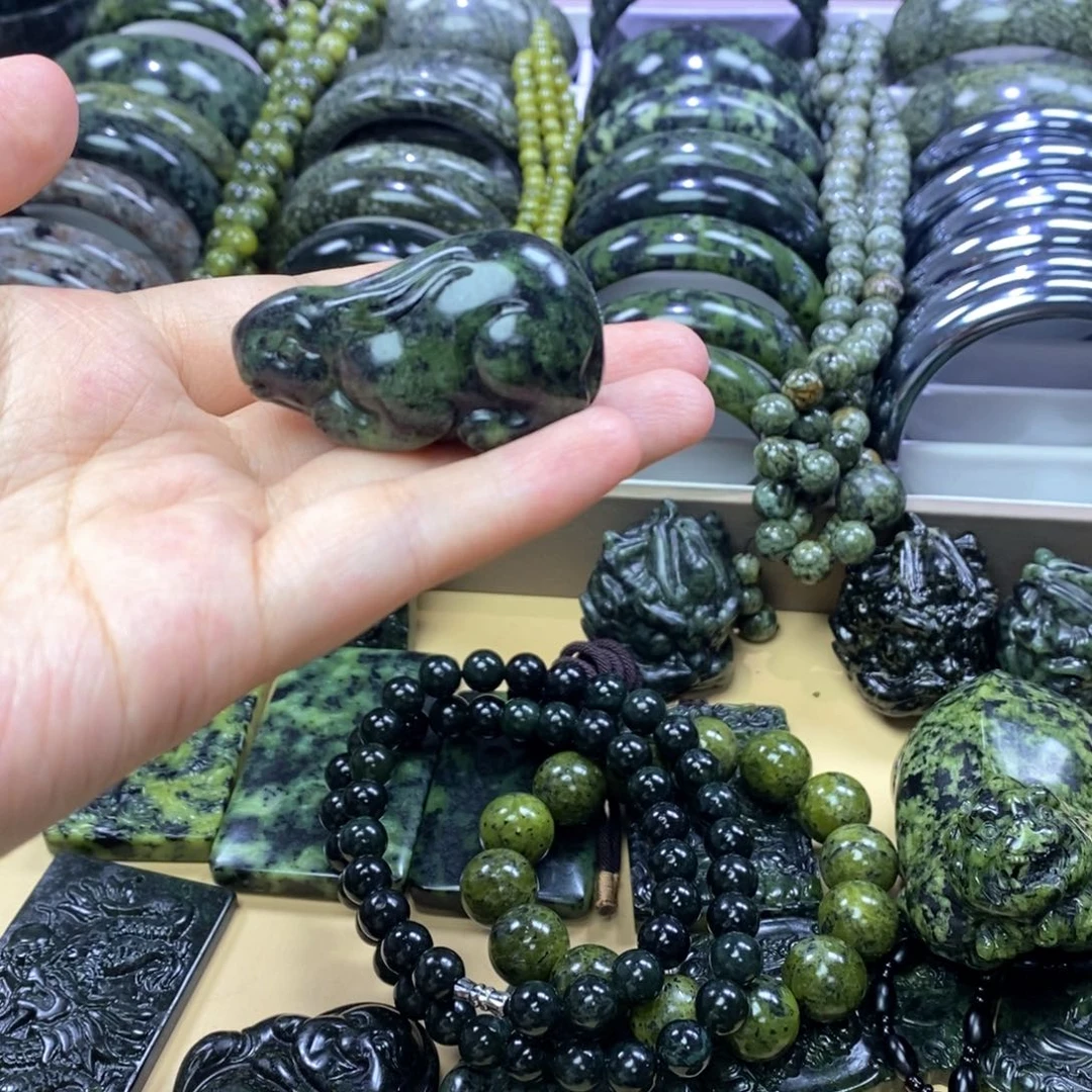 蛇纹石玉未镶嵌吊坠乐*谜