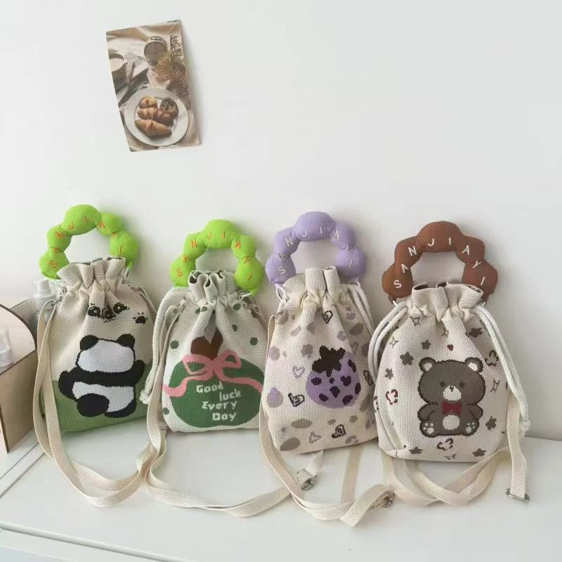 新款韩版多巴胺可爱小福袋小众百搭设计针织斜挎包学生便携手机包