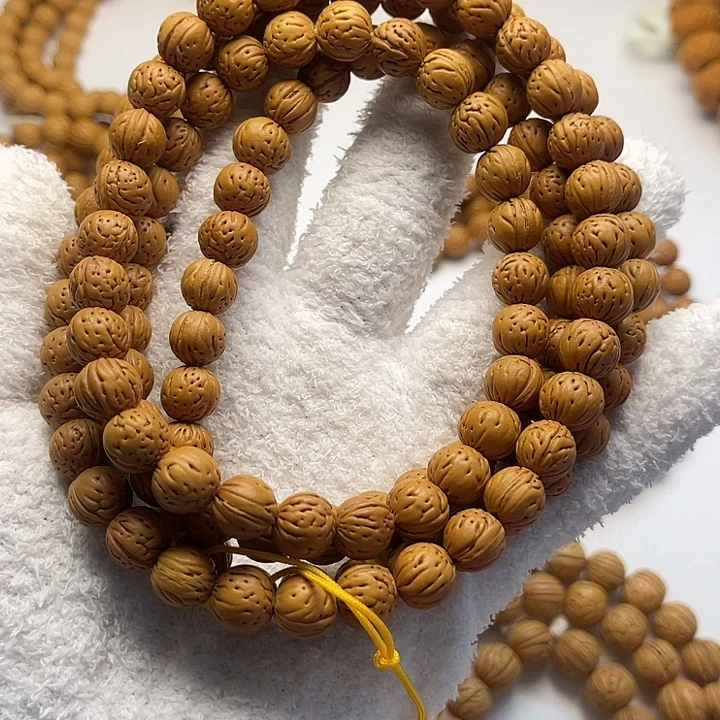 请***哥桃核吊坠野生全品无修脖挂