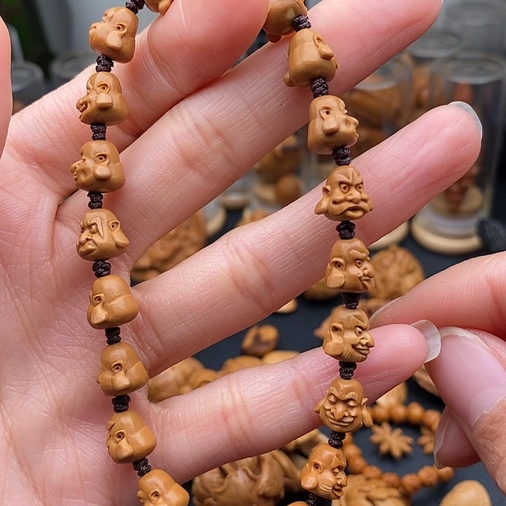 橄榄核吊坠暴***猫核尖十八罗汉