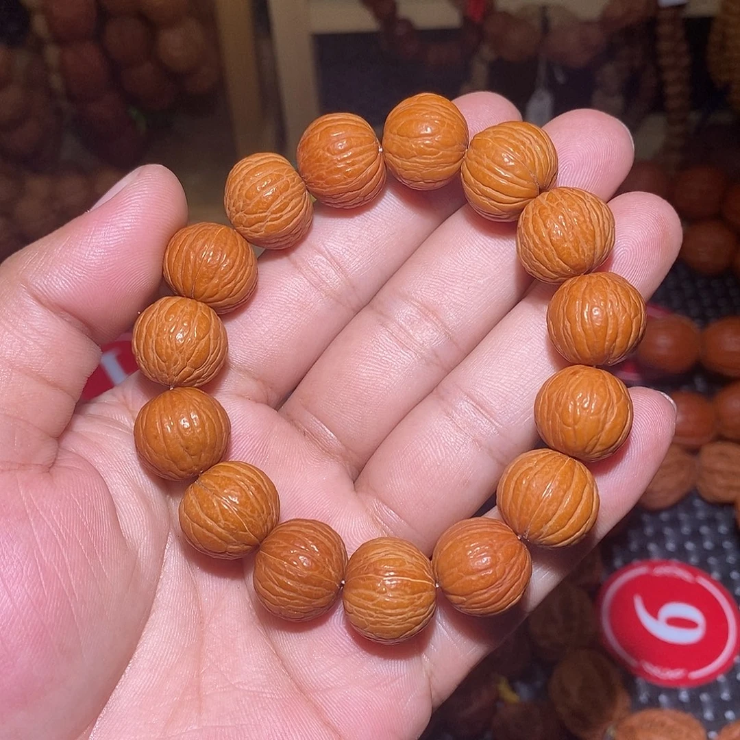 玥****文玩核桃手串猴头