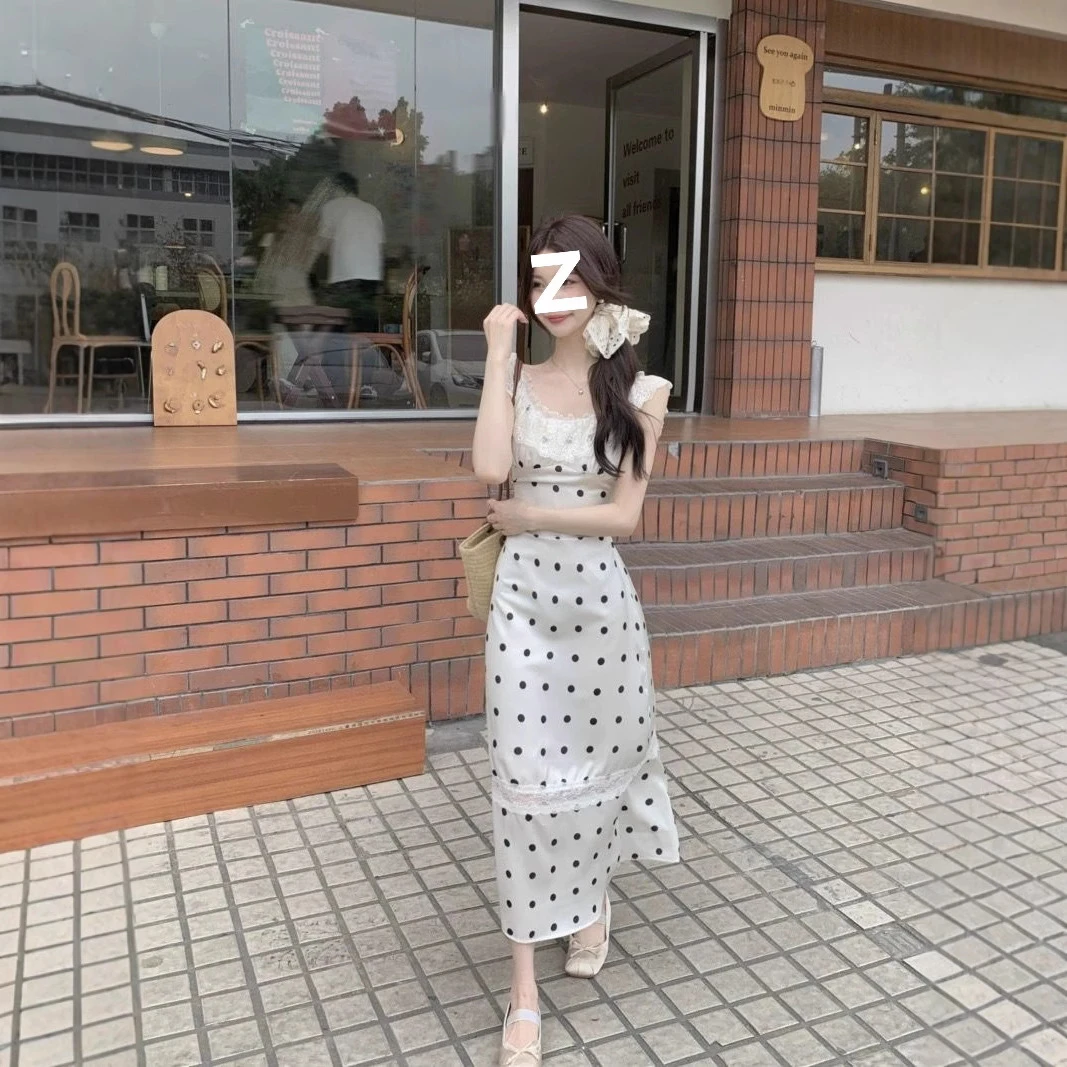 蕾丝花边拼接露背波点连衣裙女夏季新款设计感显瘦系带背心长裙潮