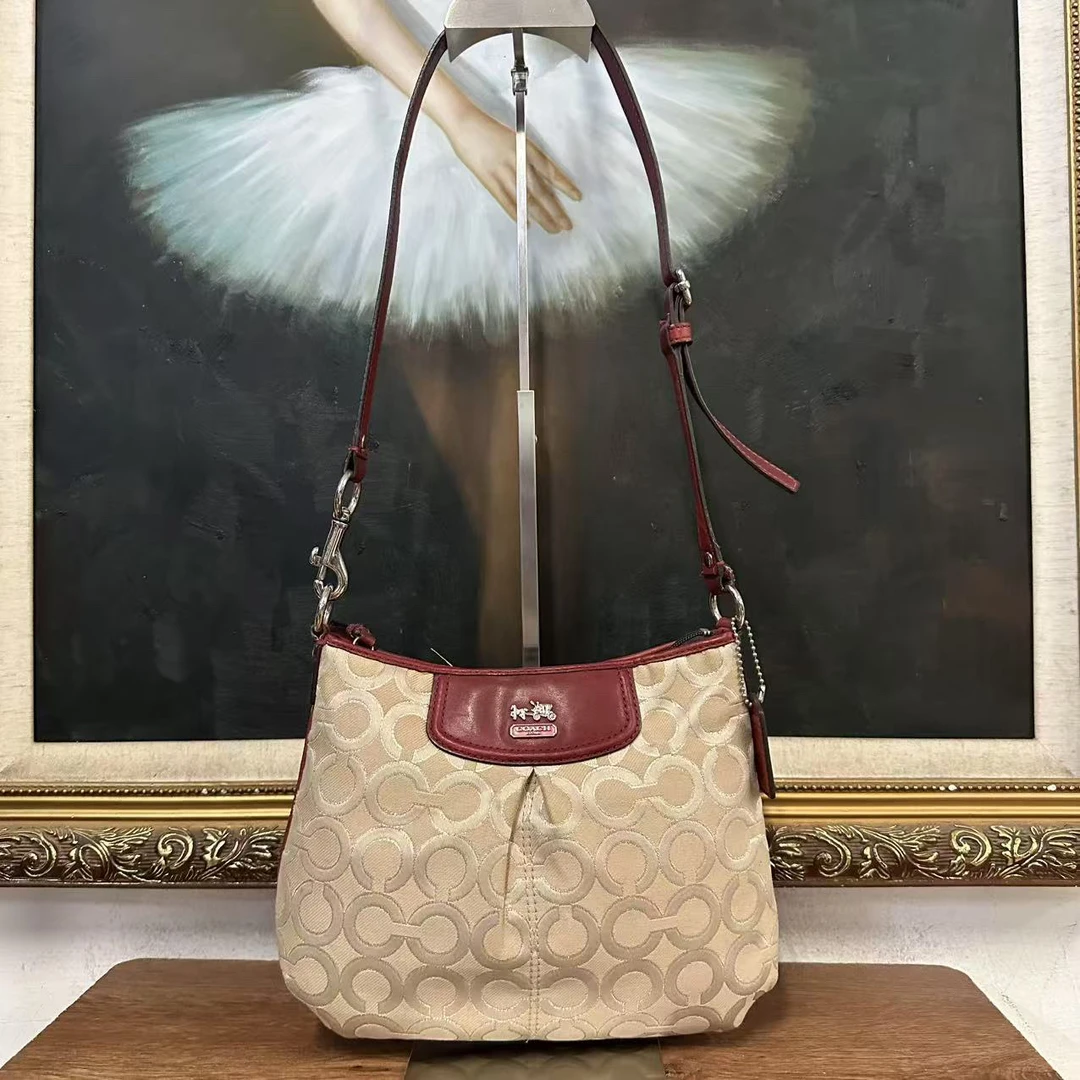 95新 coach单肩包/002182