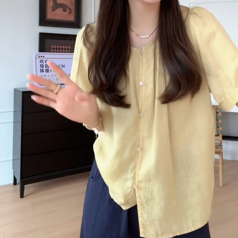 2025夏季休闲时尚百搭舒适甜美圆领珠扣短袖衬衫LK2503177