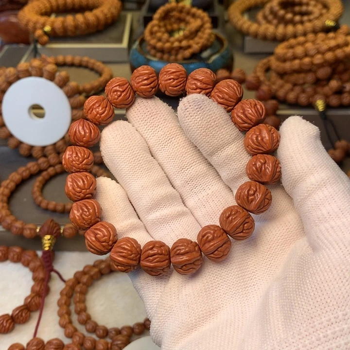 忧***迦手串桃核秦岭龙纹