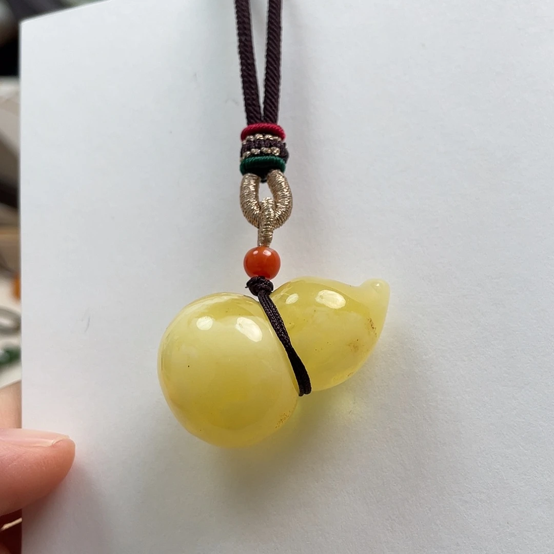 琥珀未镶嵌珠宝奇石葫芦 金瓷白 微微瑕 无裂 12.7克