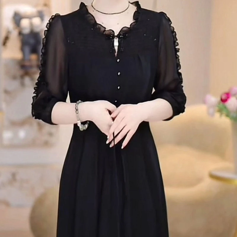 轻奢中长款黑色连衣裙2025新款夏季爆款收腰显瘦时尚气质裙子