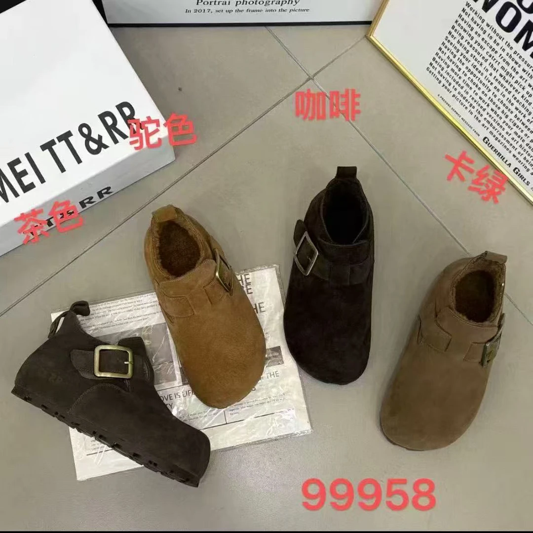 99958冬季新款加绒纯色套脚保暖平底搭扣复古百搭休闲女靴