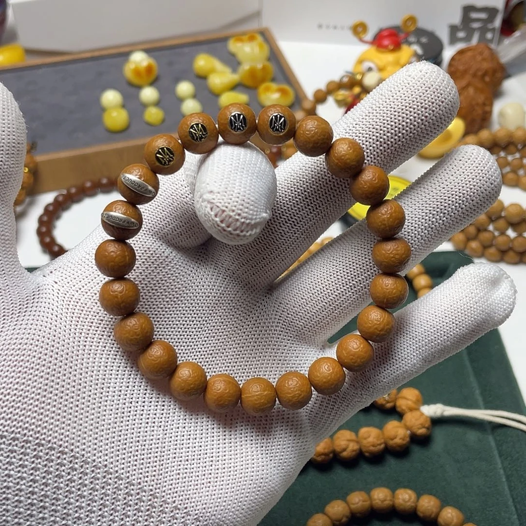 糖***豆猴头核桃吊坠波澜不惊镶标款