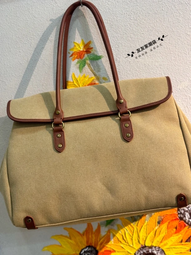 【友友家】2025小众设计水洗帆布配头层牛皮手提购物袋